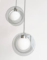 Image 1 of //VENDIDAS//  LÁMPARAS VINTAGE CON AROS DE VIDRIO, AÑOS 70