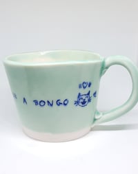 Image 3 of cats love to be a bongo