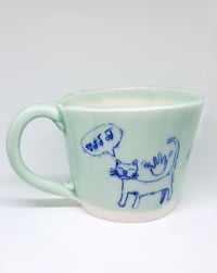 Image 1 of cats love to be a bongo