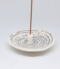 Image 1 of white & black swirly incense holder