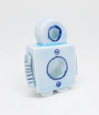 Image 2 of a robot who knows the truth is out there