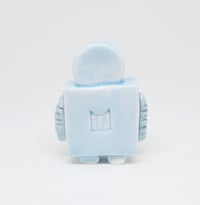 Image 3 of a robot who knows the truth is out there