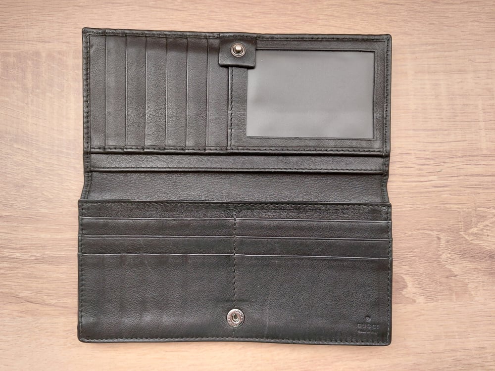 Image of Gucci black leather GG monogram wallet