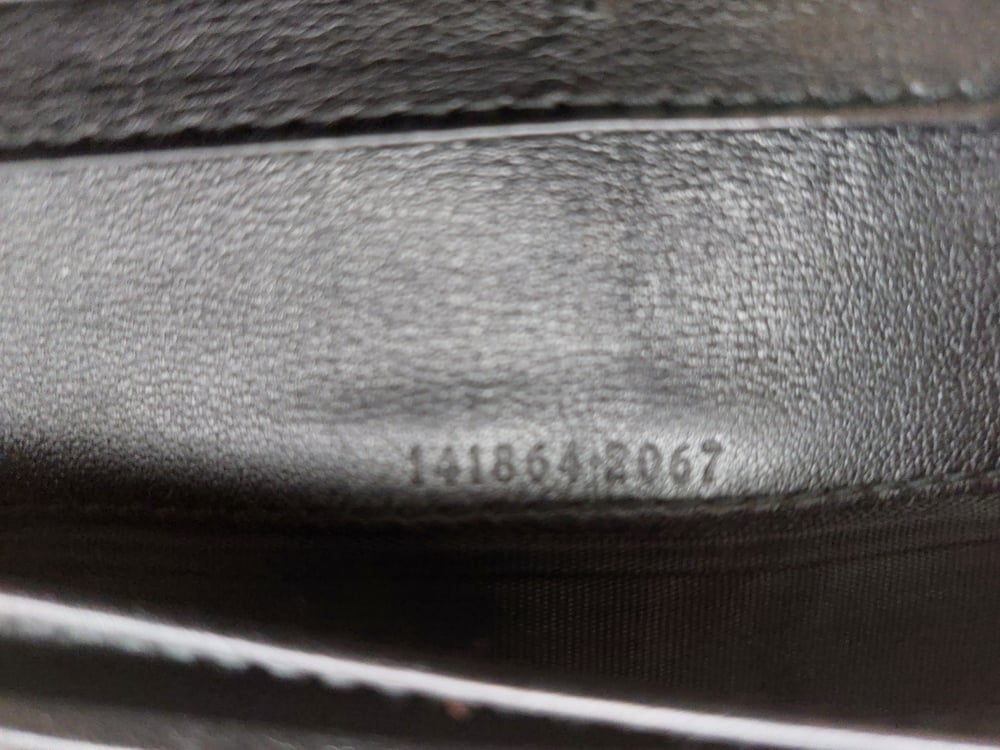 Image of Gucci black leather GG monogram wallet
