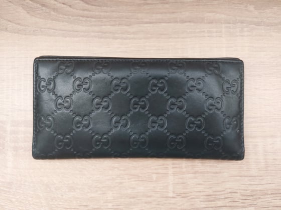 Image of Gucci black leather GG monogram wallet