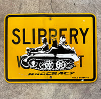 "Slippery When Wet" -  Idiocracy street sign
