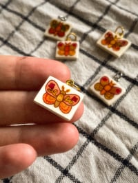 Image 1 of flower moths
