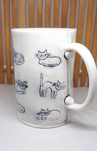 Image 1 of a day in the life of a cat mug