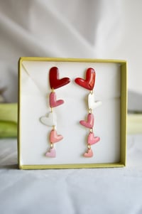 Image 1 of Mil corazones 