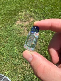 Image of Mini skull pendant 