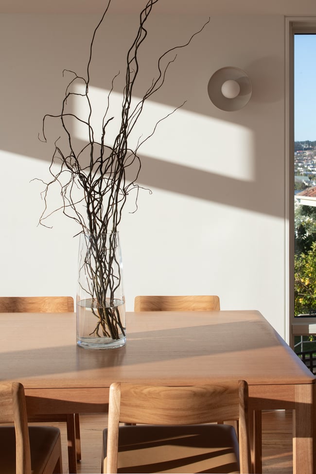 ROSE DINING CHAIR IN TASMANIAN OAK WITH AN UPHOLSTERED MACADAMIA LEATHER SEAT