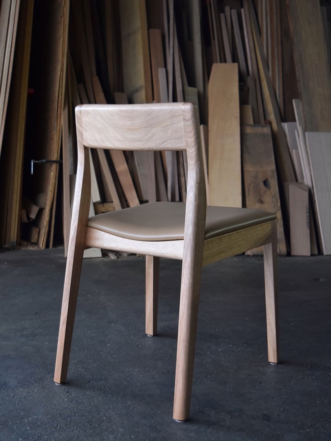 ROSE DINING CHAIR IN TASMANIAN OAK WITH AN UPHOLSTERED MACADAMIA LEATHER SEAT