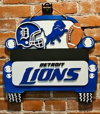Image 1 of Football doorhangers