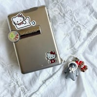 Image 2 of sanrio hat raccoons