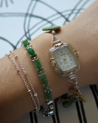 Image 3 of green button watch