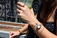 Image 2 of green button watch