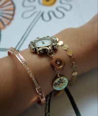 Image 3 of multicolor earthtone button watch