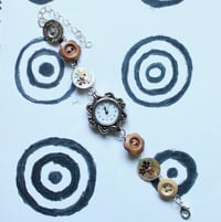 Image 1 of multicolor earthtone button watch