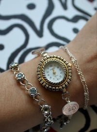 Image 2 of silver only button watch