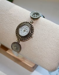 Image 4 of silver only button watch