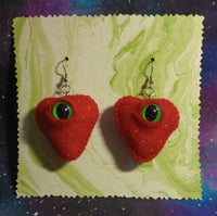 Image 1 of A pair of fabric art strawberry creature earrings 