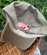 Image 3 of Dark and light pink hand embroidered flowers on an adjustable khaki colour hat
