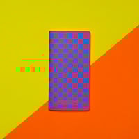 Image 2 of Pink with blue checks slim notebook.