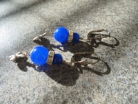 Image 4 of 1920s Style Fleur de Lis Earrings in Cobalt Blue, Pierced or Clip On