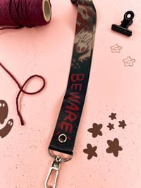 Image 3 of Beware! Cryptid Long Lanyard