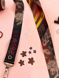 Image 1 of Beware! Cryptid Long Lanyard