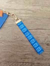 Image 5 of Severance Wristlet and Charm Keychain Set - Lumon Waffle Party