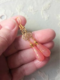 Image 2 of Art deco gold floral cut out earrings handmade with salmon pink & gold splash Czech glass drops