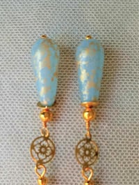 Image 10 of Art deco gold floral cut out earrings handmade with sky blue & gold splash Czech glass drops