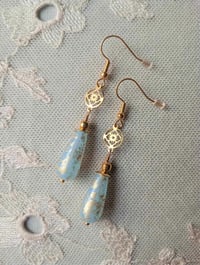 Image 6 of Art deco gold floral cut out earrings handmade with sky blue & gold splash Czech glass drops
