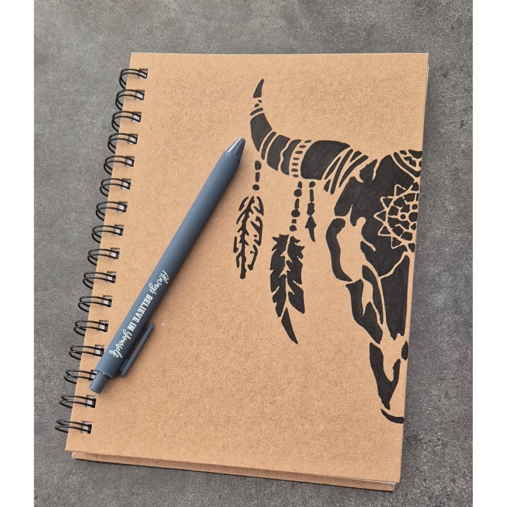 Image of Hand-drawn Spiral Bound Notebook and Pen