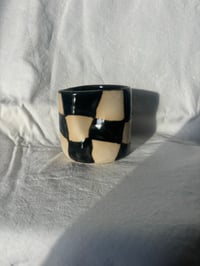 Image 3 of wobbly checker cup