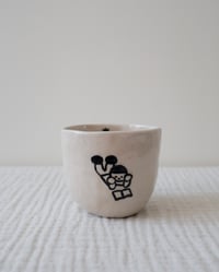 Image 1 of ‘Reading book and thinking nothing’ cup