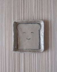 Image 1 of ‘Piece of happy bread’ flat
