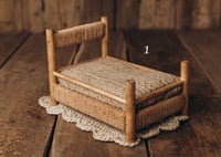 Image 10 of A wooden bed wrapped with thick rope
