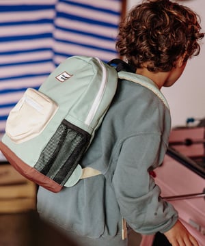 Image of Mochila escolar verde almendra y amarillo pálido talla 2-5 años y +6 años