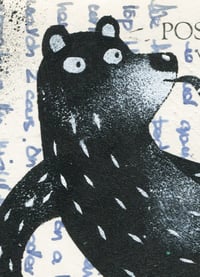 Image 4 of Reclining Bear with Pipe