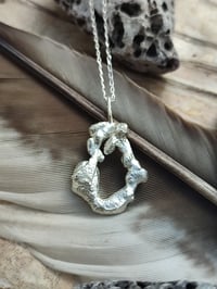 Image 1 of Molten silver