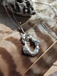 Image 2 of Molten silver