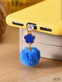 Blue clover puff ball phone accessory 