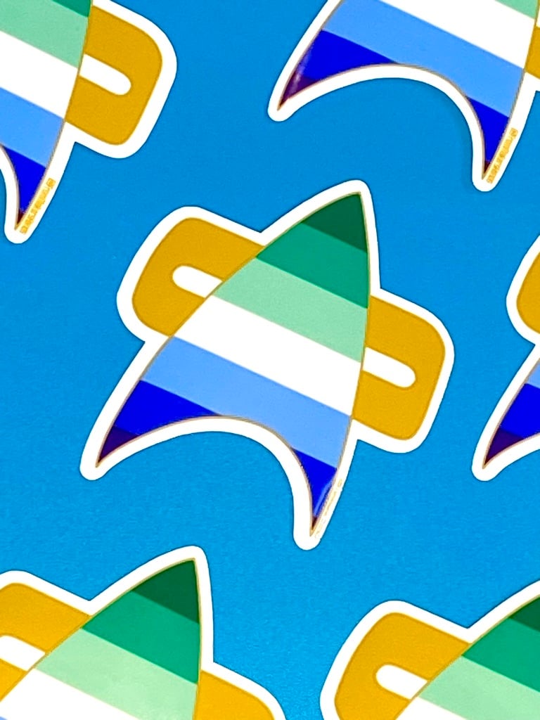 Image of Men's Pride Com Badge Sticker, Pride, LGBTQIA+, Star Trek Voyager, DS9