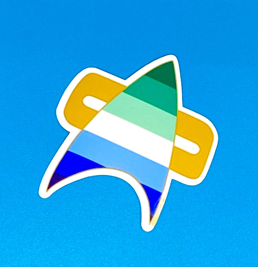 Image of Men's Pride Com Badge Sticker, Pride, LGBTQIA+, Star Trek Voyager, DS9