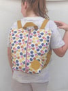 Wet Bag Mochila Flores mostaza
