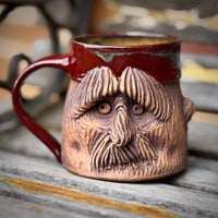 Image 1 of Carved Face Mug