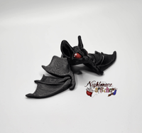 Image 1 of Baby Flexi Bat - Black with Red eyes