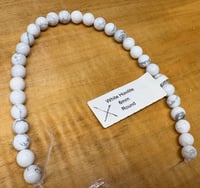 Image 3 of White Howlite 6mm round 8 inch strand Approx. 31 beads